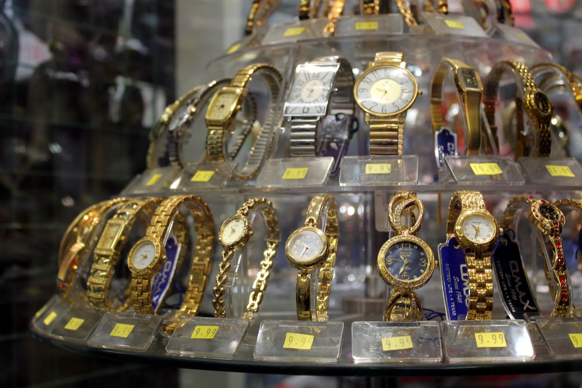 A carousel display of gold-tone ladies' and dress watches